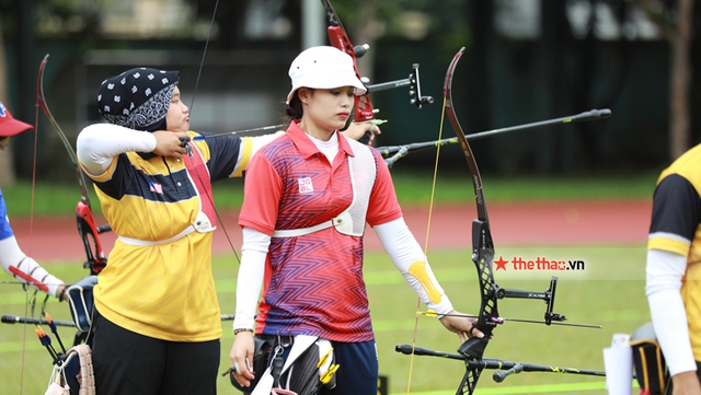 Cung thủ Ánh Nguyệt, Thanh Nhi khoe sắc trong ngày mạc môn bắn cung SEA Games 31 - Ảnh 2.